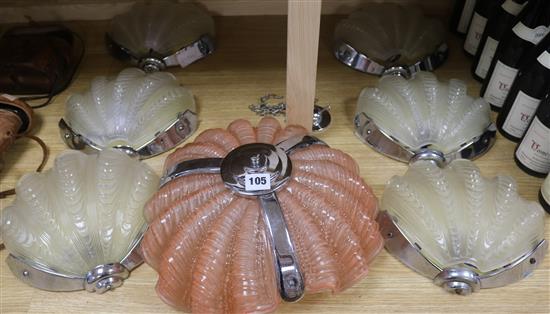 An Art Deco glass shell central light fitting and a set of six similar wall lights